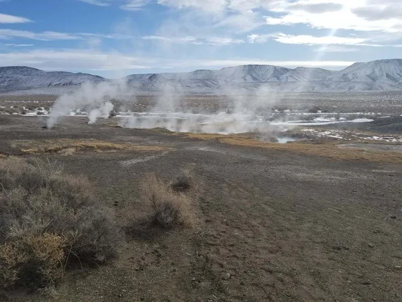 Winter steam rising from the viewing-only geothermal area at Mickey Hot Springs